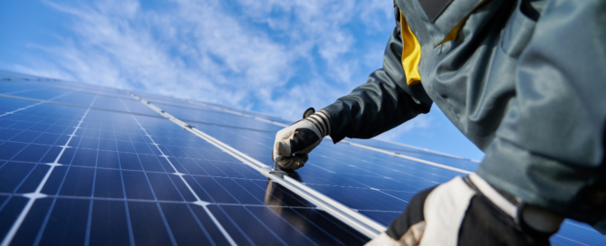 Technician installing solar panels for Go Local Powur, ensuring efficient and sustainable energy solutions.