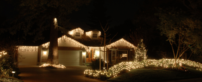 Beautifully illuminated home with solar-powered holiday lights, showcasing energy-efficient and sustainable decorations by Go Local Powur.